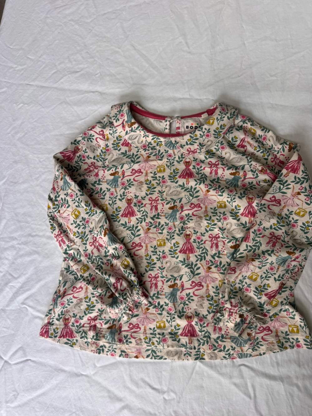Mini Boden Cream Top with Pink Trim and Floral Nutcracker Print